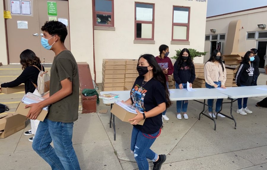 Students from each second period where on hand Thursday to help distribute the 2021/2022 student agenda books back in their classes.