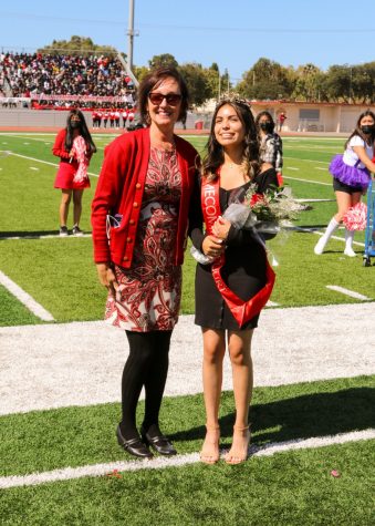 Dianna Perez, escorted by Ms. Quaid, was crowned Homecoming Princess at the rally.