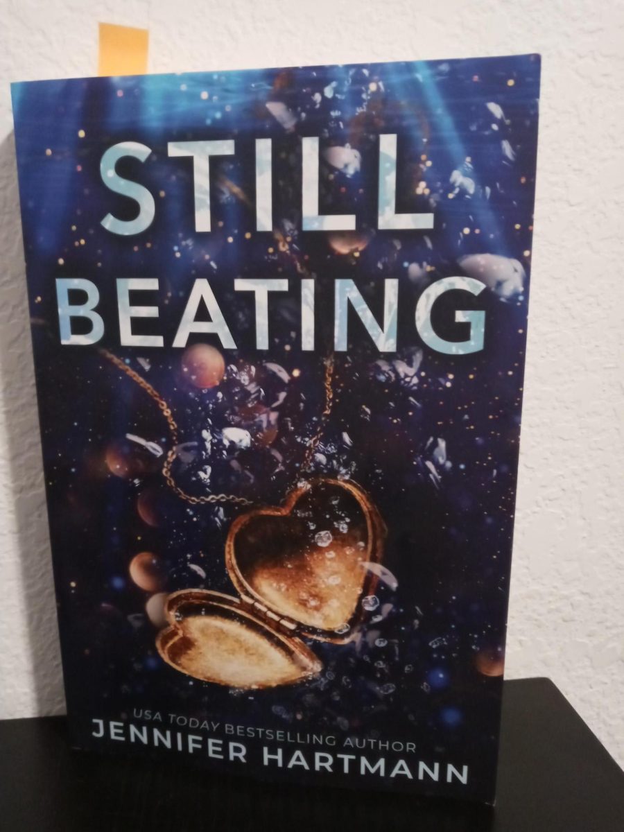 The cover of the book Im reviewing, Still Beating by Jennifer Hartmann.